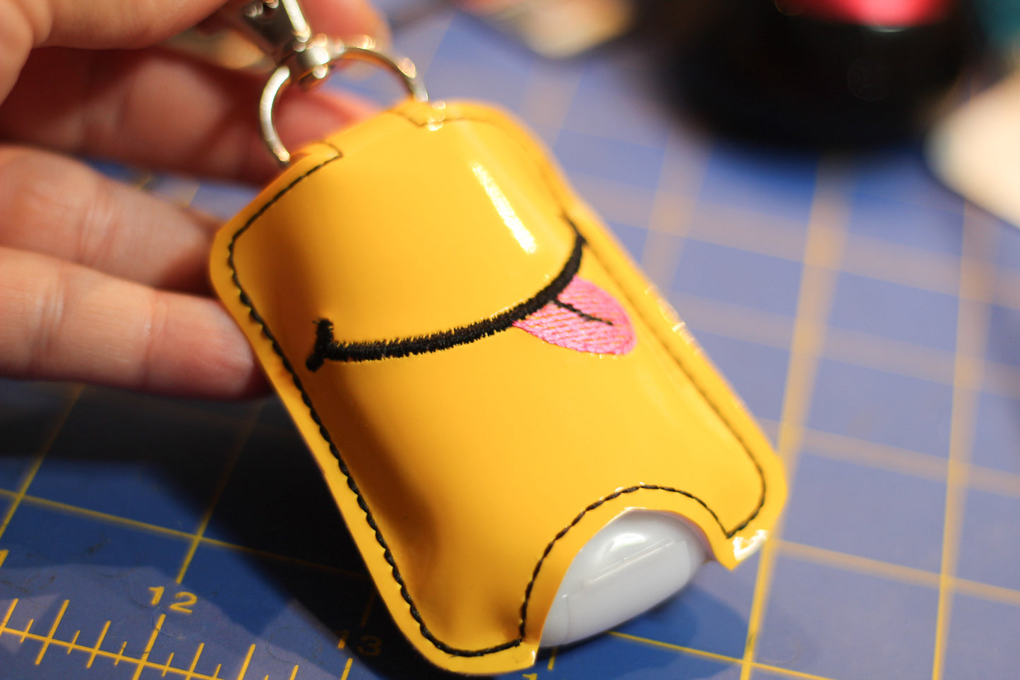 DBB Smiley Face with Tongue Hand Sanitizer Holder Snap Tab Version In the Hoop Embroidery Project 1 oz BBW for 5x7 hoops