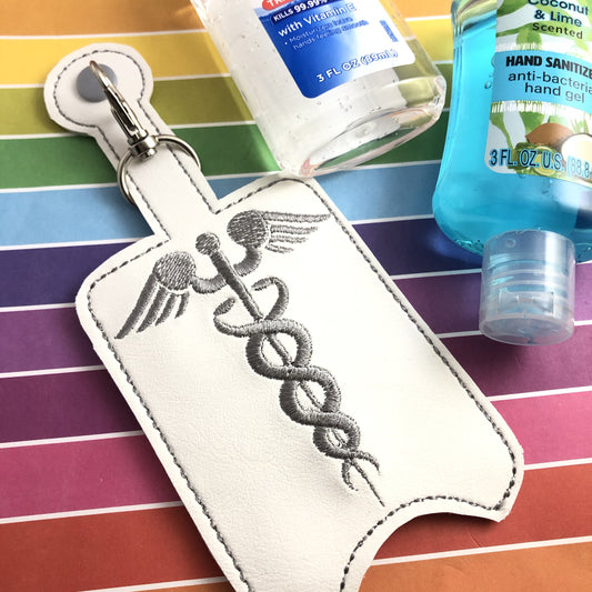 DBB Caduceus Hand Sanitizer Holder Snap Tab Version In the Hoop Embroidery Project 3 oz DT for 5x7 hoops
