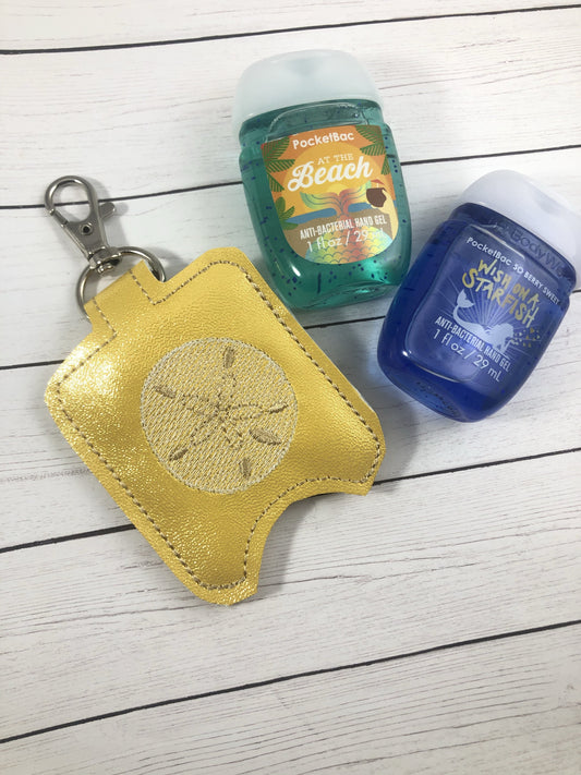 DBB Sand Dollar Hand Sanitizer Holder Snap Tab In the Hoop Embroidery Project